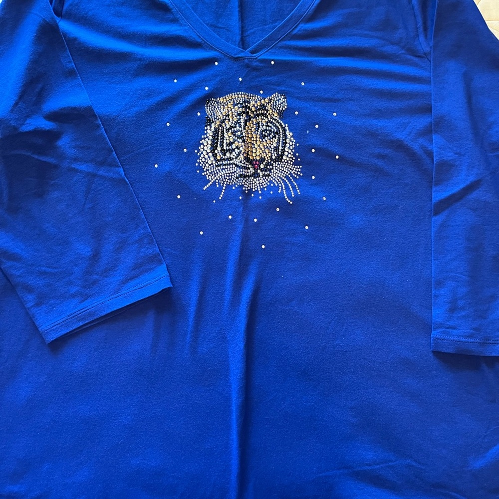 Blue 3/4 sleeve top with rhinestone tiger in front and black 22 on the back 2X
